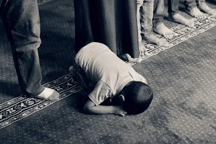 Praying with on the ground