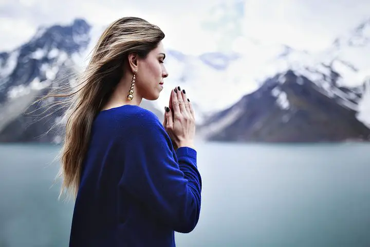 Woman praying alone